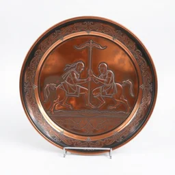 a copper platter with embossing of medieval knights