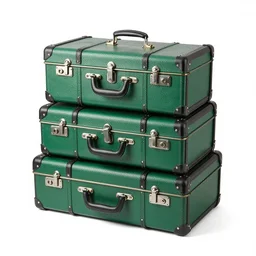 emerald green vintage suitcase stack, 8k product photo, isolated on a pure white background, centered, entire object in frame, sharp focus, soft studio lighting