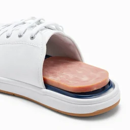 tennis shoe that slides apart to reveal a hidden compartment containing lunch meat, product photo