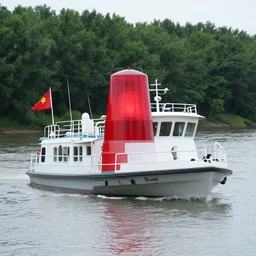 look out mama there's a white boat coming up the river, with a big red beacon and a flag and a man on the rail.