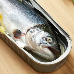 can of salmon with the full salmon head in it