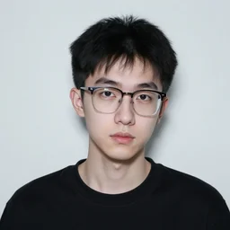 a man in his mid twenties, with glasses, short black hair, pale white skin