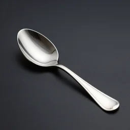 A reflective silver spoon