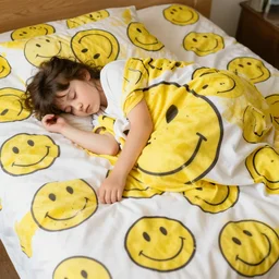 asleep on a bed of smiley faces