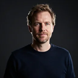 ton roosendaal a dutch software developer and film producer, realistic portrait, high contrast, rim light, dramatic lighting