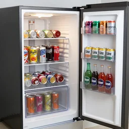 a refrigerator with the door open, lots of cans of drinks inside