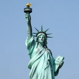 the statue of liberty with both hands lifted in the air