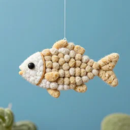 a fish made out of cotton - weaved fish pellets on a line catching the shroomerfish