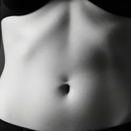 female navel closeup black and white
