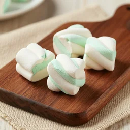 photograph of a marshmallow cube with mint swirls on a dark wooden chopping board, hessian cloth, styled food photography, photorealistic, 4 k