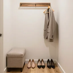 1 5 pair of shoes in hallway with ottoman and clothes hanger