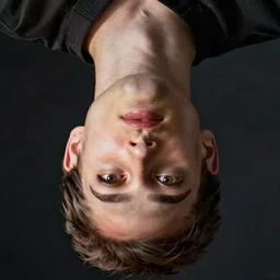 a man with an up - side - down face