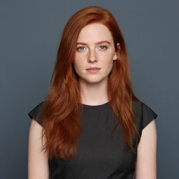photo of a twenty year old woman in formal clothes taken by annie leibovitz, red hair, freckles