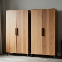 two large armoire with slightly crooked doors in a room with an xbox