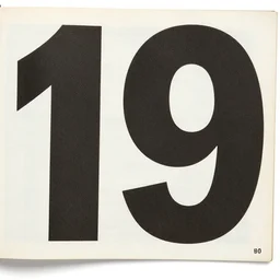 a photo and large text, 1 9 9 0's photograph magazine.