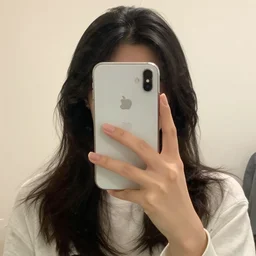 A mirror selfie with an iPhone
