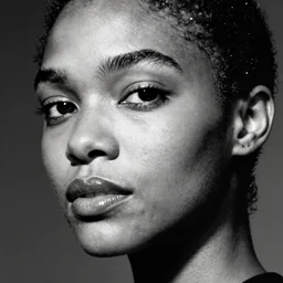 black and white vogue closeup portrait by herb ritts of a beautiful female model, mixed race, high contrast
