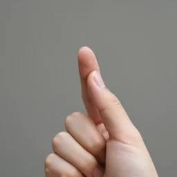 a hand holding somethinf between index finger and thumb