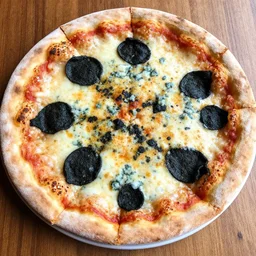 a pizza with black and blue cheese