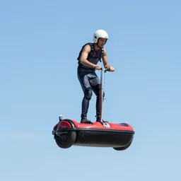 man riding a levitating hovercraft