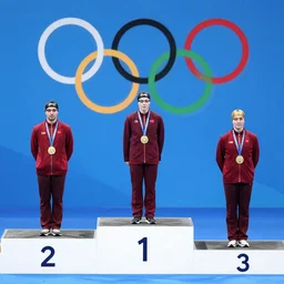 sport photography of the podium at olympic games swimming competition