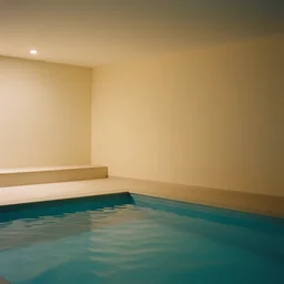 noisy color photograph of a liminal pool room, terraces, minimalist, oddly familiar, cinematic, soft vintage glow