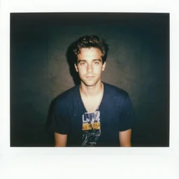 polaroid of david rose from schitt's creek, 1 9 8 0 s, harsh flash