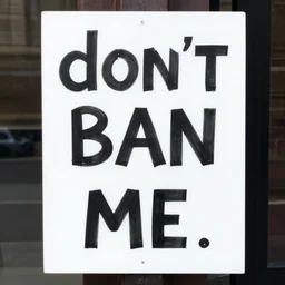 sign that reads don't ban me, pretty please