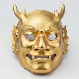 a close - up studio photo of a golden dragon mask made in spring and autumn period
