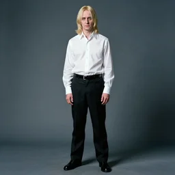 high school yearbook photo of voldemort, wearing a white shirt and black trousers, 2 0 0 9