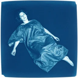 a cyanotype of a deflating woman by zdzisław beksinski