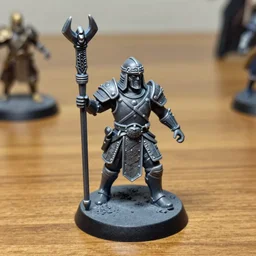 3 d printed fantasy miniature figure warrior on a wooden table photography realistic, detailed