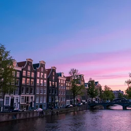 amsterdam with in the year 2 1 4 5. 4 k blue pink purple sunset