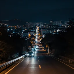 looking down road, a mini town, mid night, dark, car lights