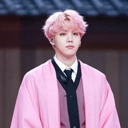 photo of Jin from BTS as a pink korean wizard