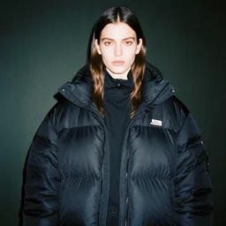 realistic! photoshoot for a new balenciaga lookbook, color film photography, portrait of a beautiful woman wearing a puffer jacket, photo in style of tyler mitchell, 35mm