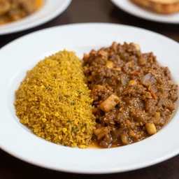 close - up focused dslr photograph of an guinean dinner, 8 k, high detail, volumetric lighting, hyperrealism, aesthetically pleasing, studio lighting, trending