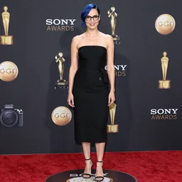 photo of a gorgeous Gal Gadot (1950) blue pixie cut hair nerdy glasses by Mario Testino, detailed, full body shot, award winning, Sony a7R