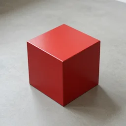 a red metallic cube on a floor
