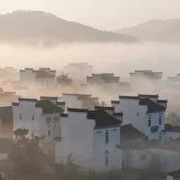 in the morning light, the misty chinese architecture is very beautiful under the clouds, light effect