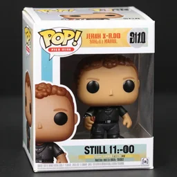 product still of faeces funko pop with box, 85mm f1.8