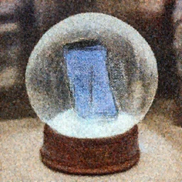 A snowglobe is on display with a smartphone inside.