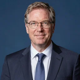 scott morrison as thanos, wearing glasses and a suit
