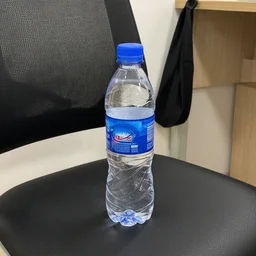 a bottle of water on a chair