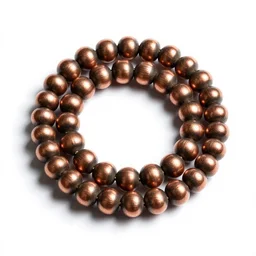 copper prayer beads, commercial catalog photo, isolated on a pure white background, centered, entire object in frame, sharp focus, soft studio lighting