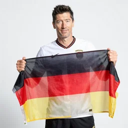 robert lewandowski holding a german flag