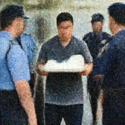 a photograph from an episode of a crime drama depicting the scene where the milk tray man is finally caught by the police