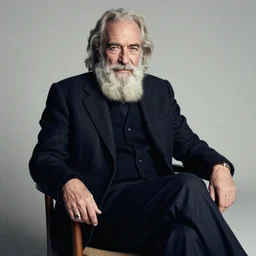 charismatic, wise man, sitting on a chair, photo for vogue by annie liebovitz