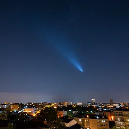 a beautiful double exposure of an astronomy photo of the day showing a close comet, with a starry cityscape with lanterns