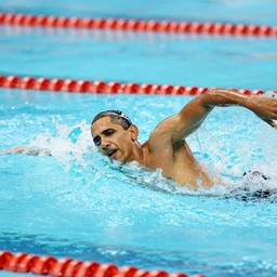 barack obama swimming laps at the olympic pool in london